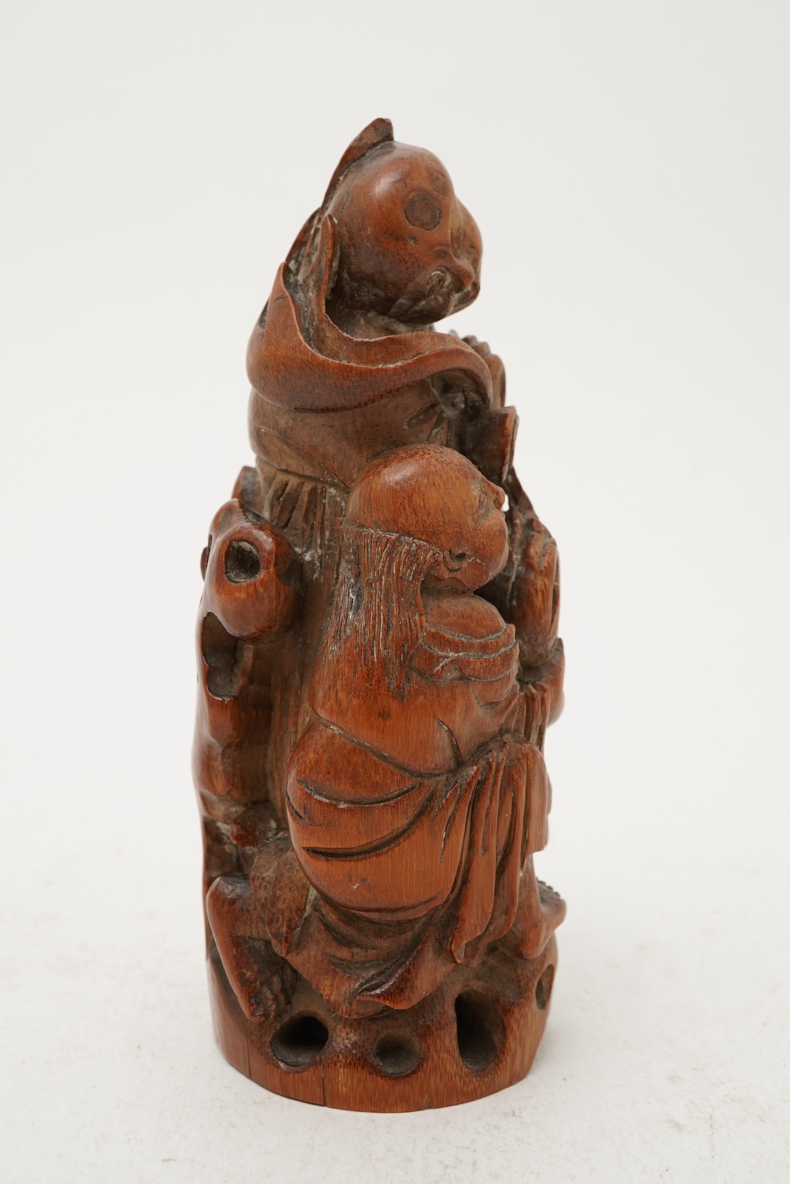 A Chinese carved bamboo group of the He He Erxian, 19th century